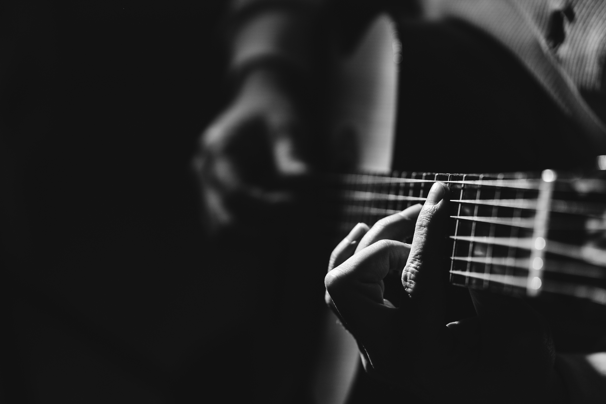 Guitar held by Toby Kieth in black and white