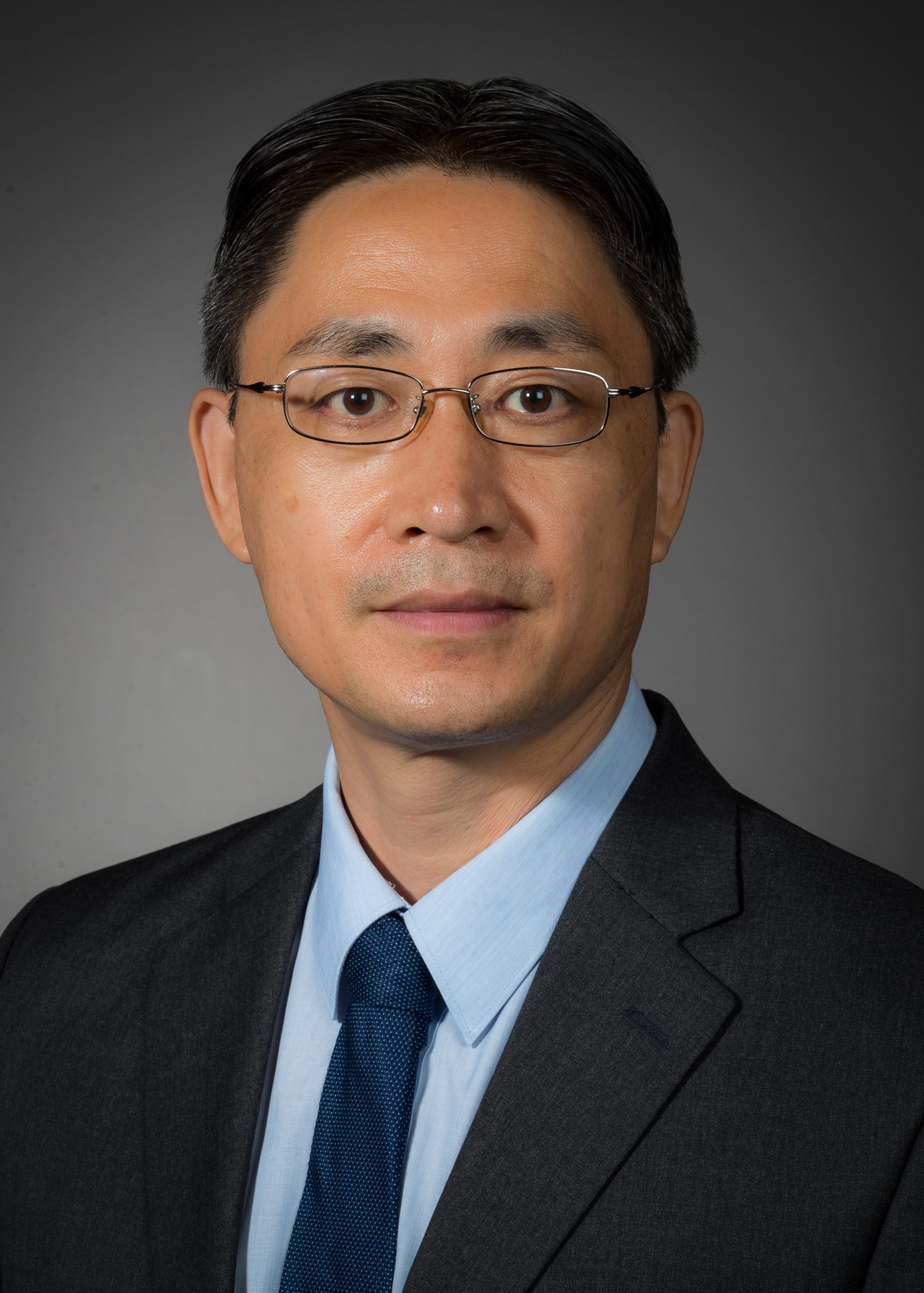 Portrait of Yangsheng Zhou, DO, Ph.D.