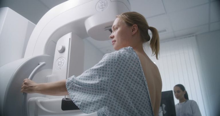 Patient undergoing mammogram to check for ductal carcinoma in situ (DCIS)