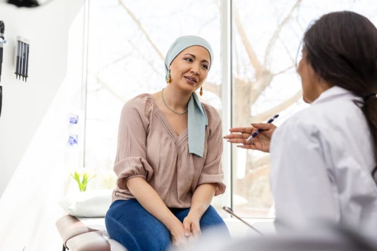 Doctor and patient discussing breast cancer treatment