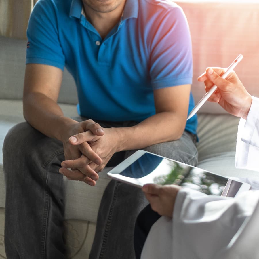 Patient and oncologist discussing prostate cancer diagnosis