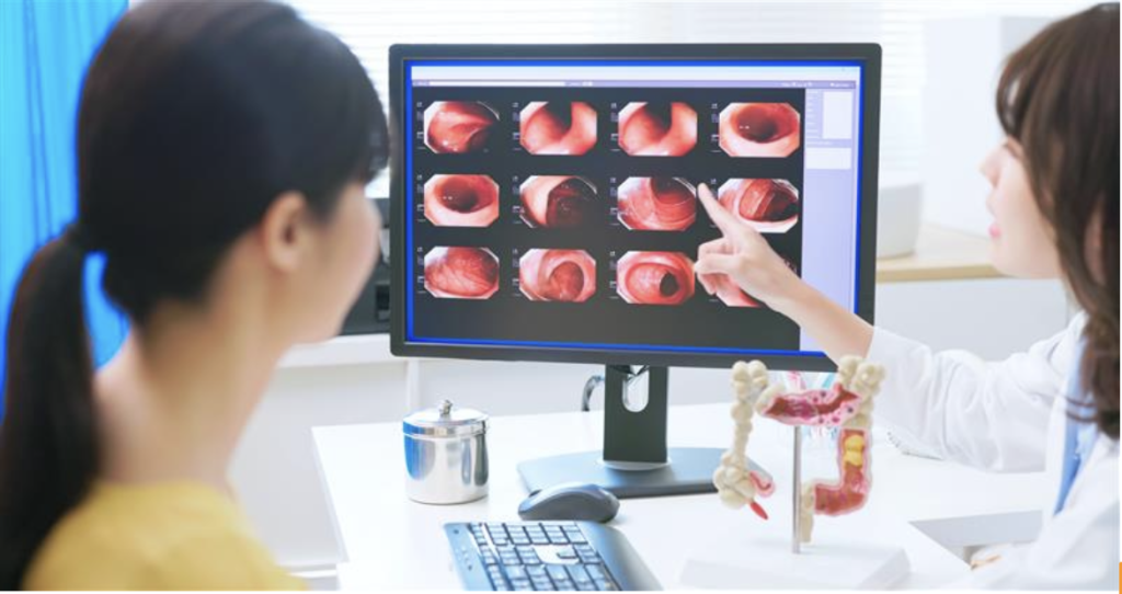 Doctor and patient reviewing colonoscopy results