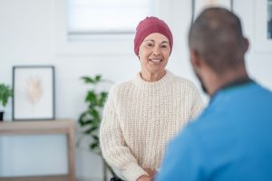 Oncologist speaking with patient
