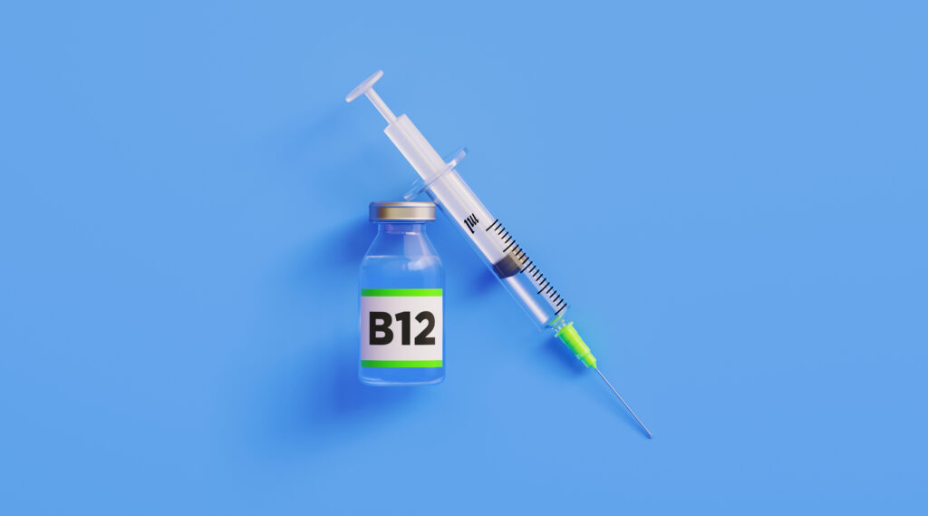 Vitamin B12 vile and syringe