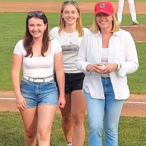Dr. Hannah Yamin, hematologist and medical oncologist at RCCA, with volunteers at Cape Cod Baseball League game