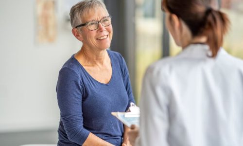 Patient and doctor discussing colon screening results